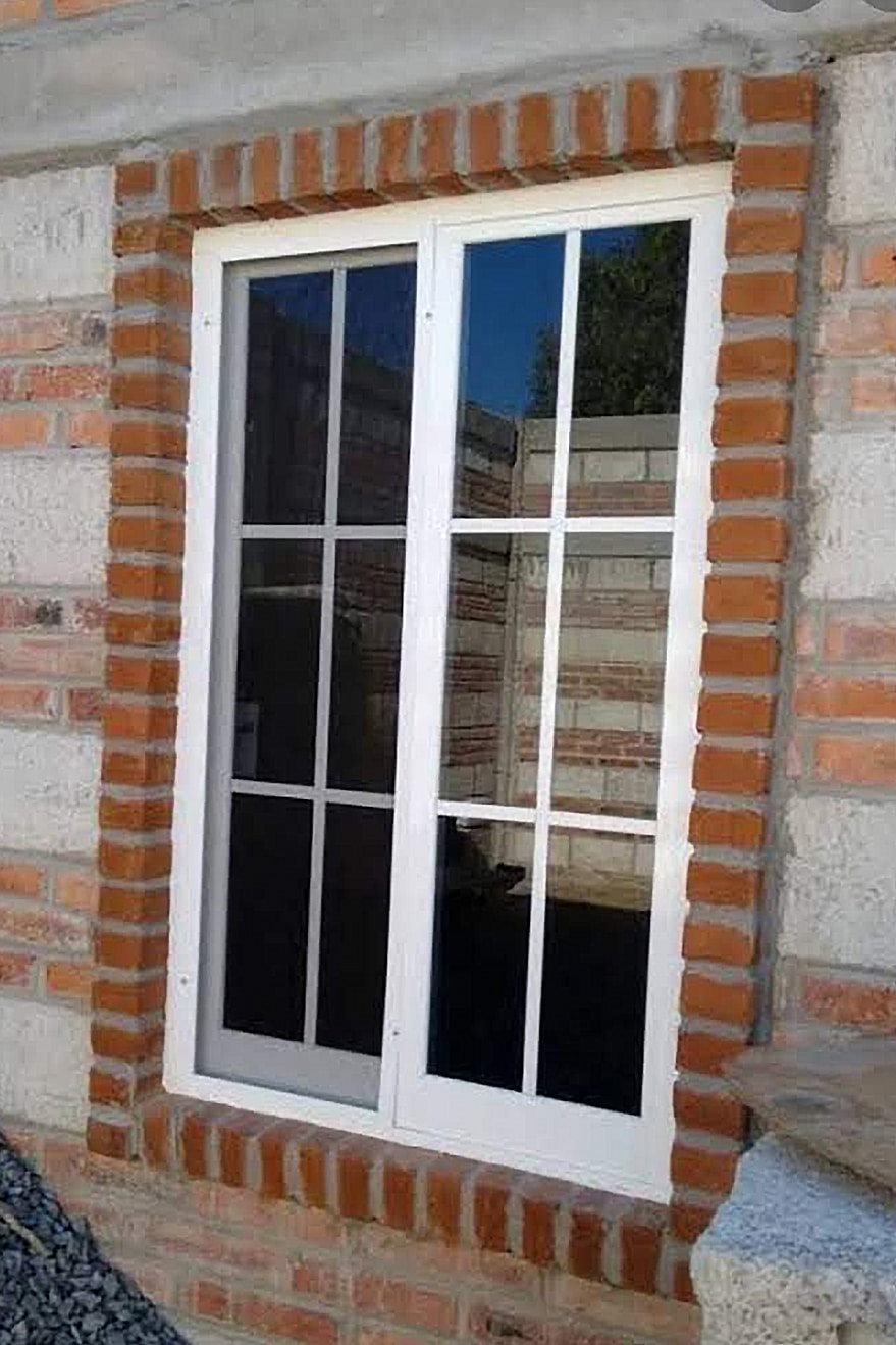 Ventana-aluminio-corrediza-cuadros-Alucort